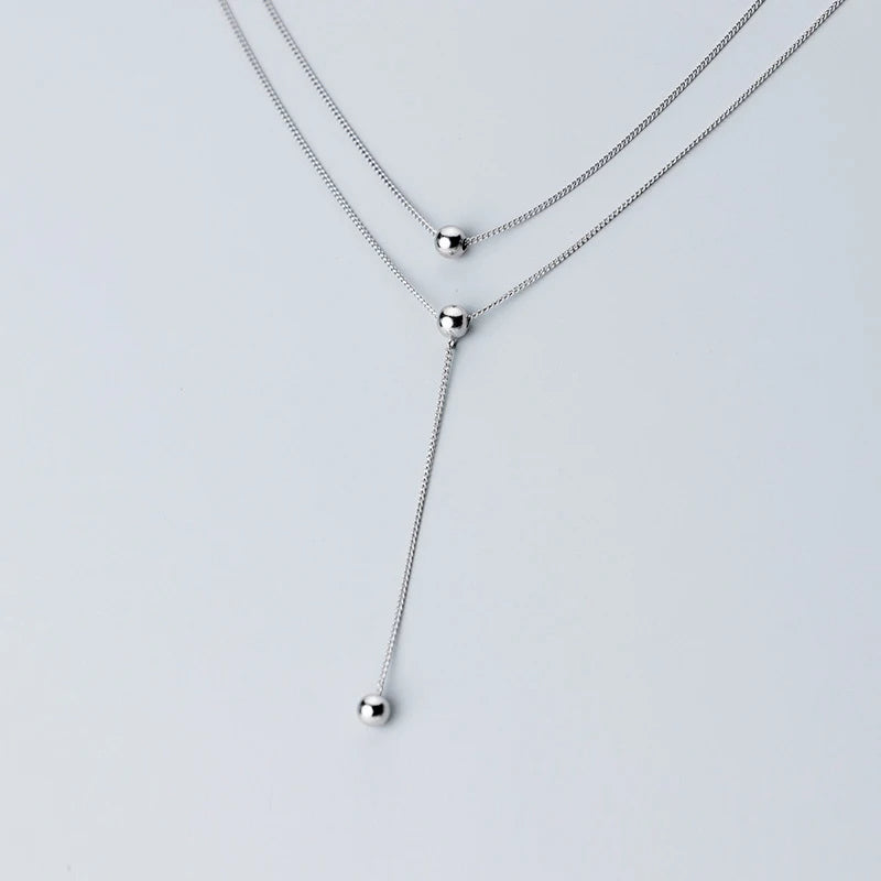 Jewelry for women featuring a sterling silver necklace with layered look