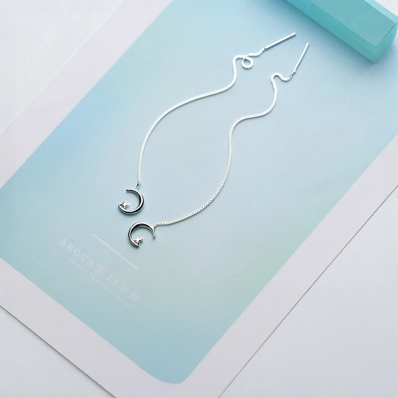 Celestial ear rings in silver color with m oo n inspired drops