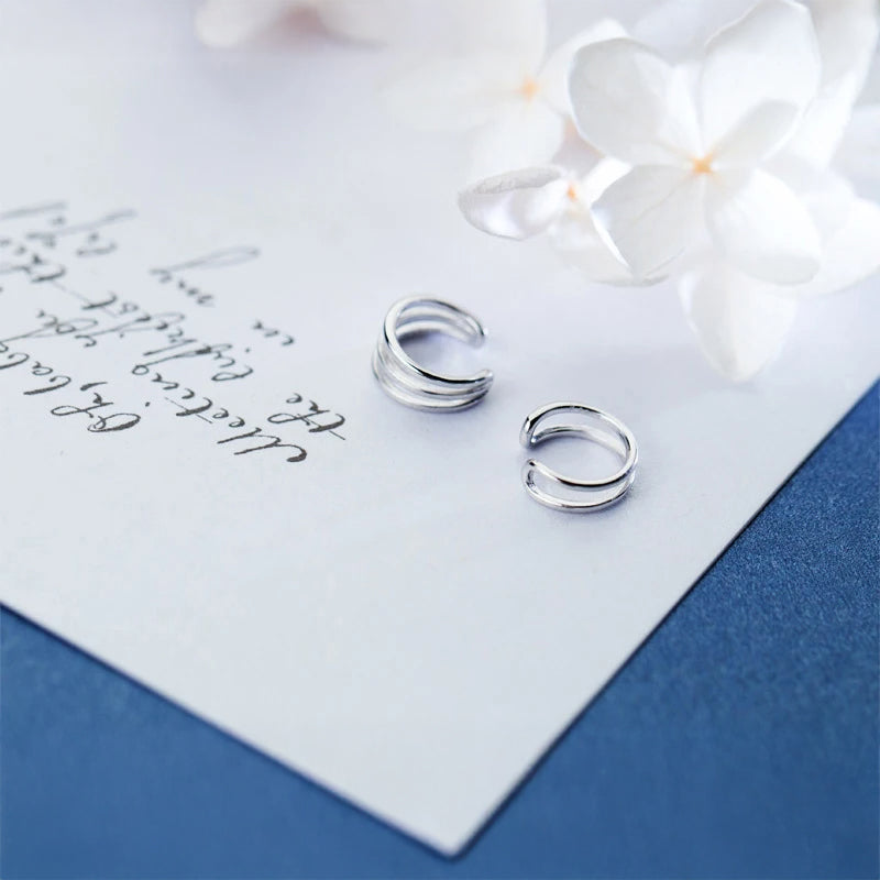 Classic ear rings styled as silver earrings for women for daily wear