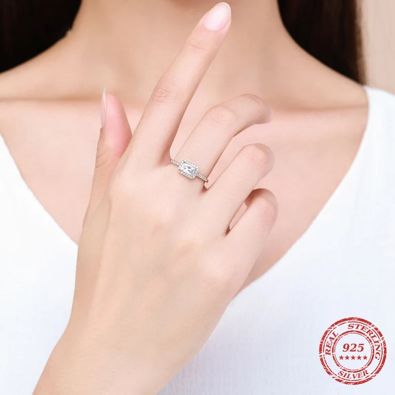 Clear cubic zirconia prong set wedding ring silver tone