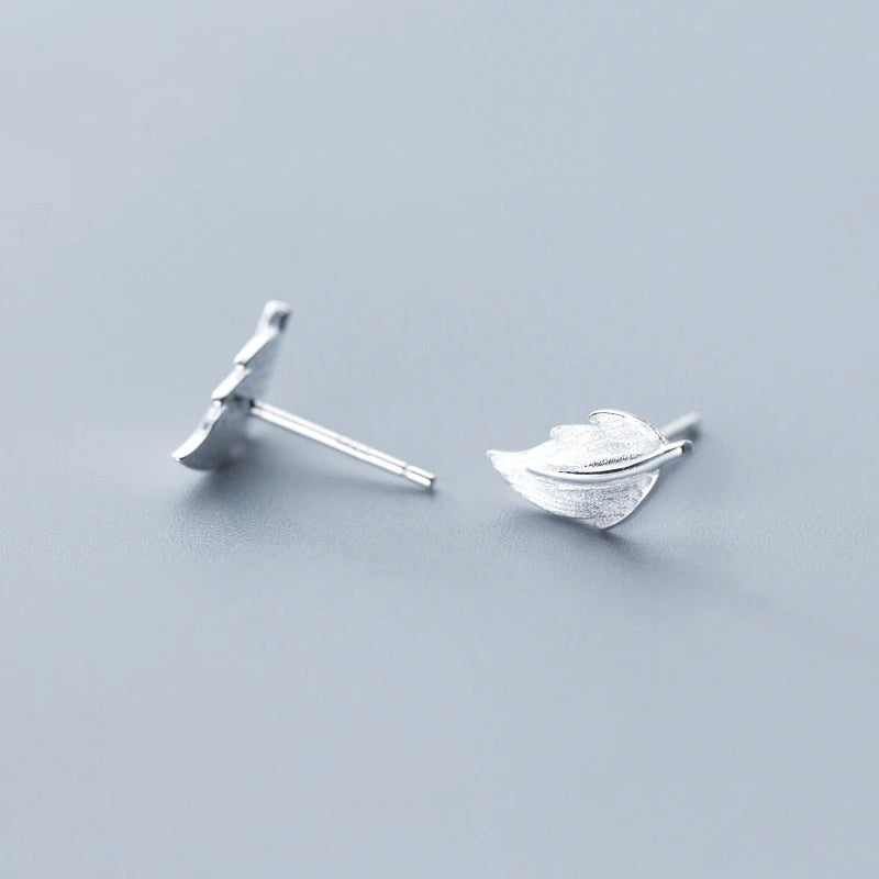 Sterling silver earrings feel with polished silver color leaf detail