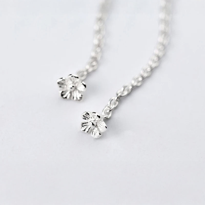 Drop earrings silver color long tassels and floral motif