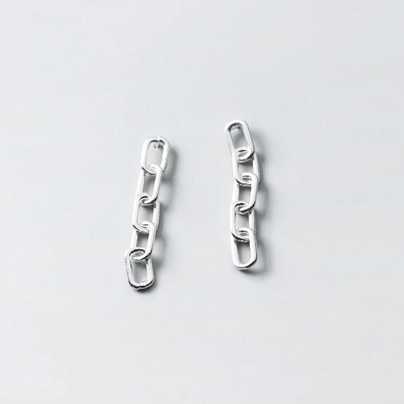 Lightweight drop earrings crafted from sterling silver with fluid sway
