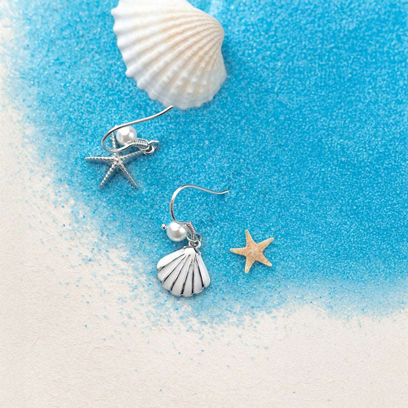 Seashell earrings aesthetic in sterling silver with romantic starfish form