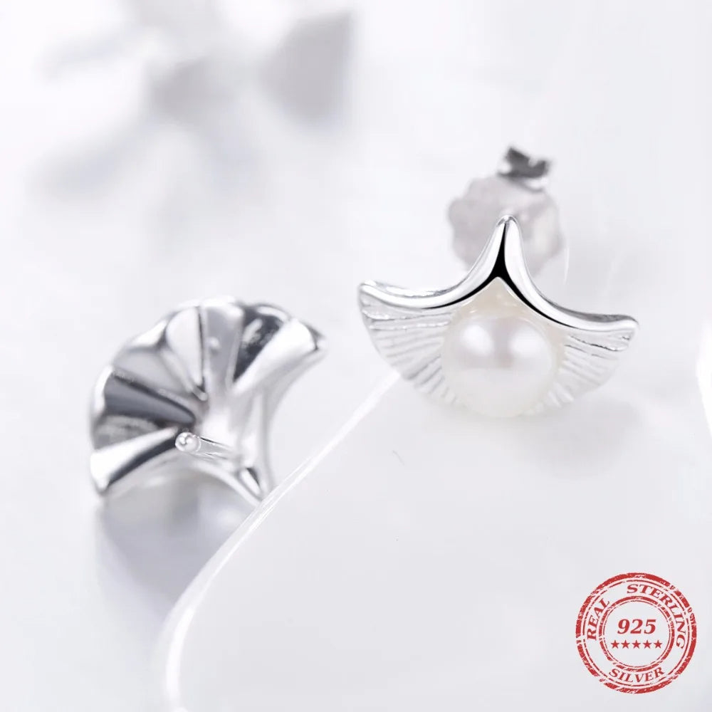 Classic ear rings showing freshwater pearl shine in stud earrings form
