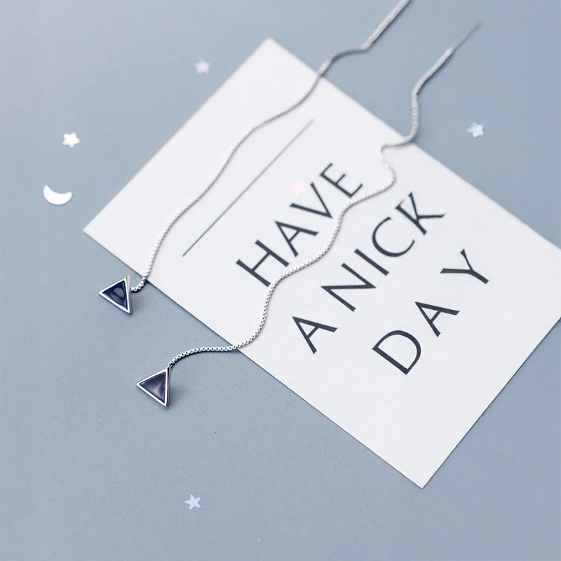 Earrings statement in silver color with geometric triangle drops