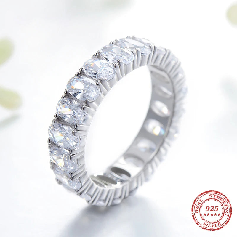 Close view of engagement ring and matching band with ring size from ring note