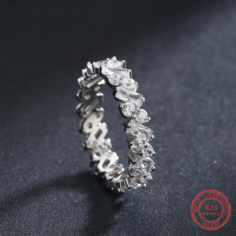 Luxury diamond eternity band in sterling silver setting