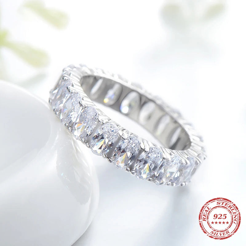 Women ring engagement in a refined oval ring style with cz rings detail