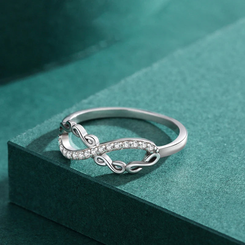 Romantic infinity motif ring perfect for wedding or anniversary