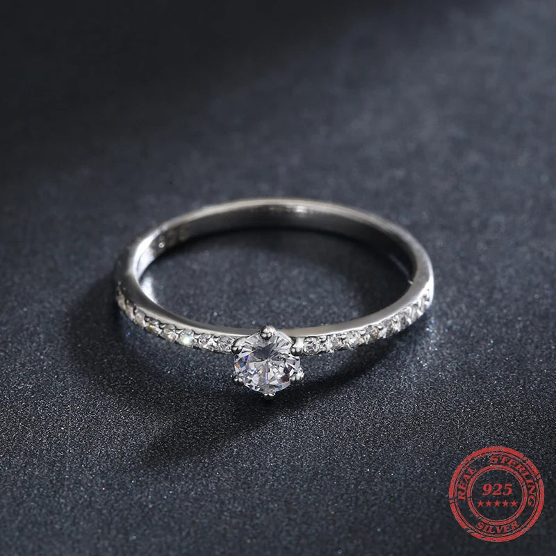 Vintage ring look with clear CZ and sterling silver finish