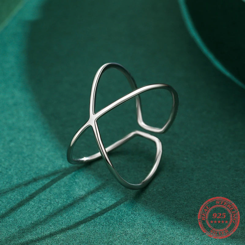 Close view of 925 sterling silver band styled as a resizable ring