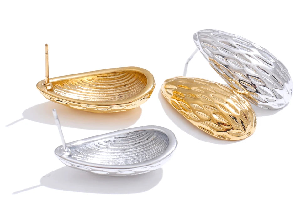 Silver earrings tones blended with warm gold glow in studs