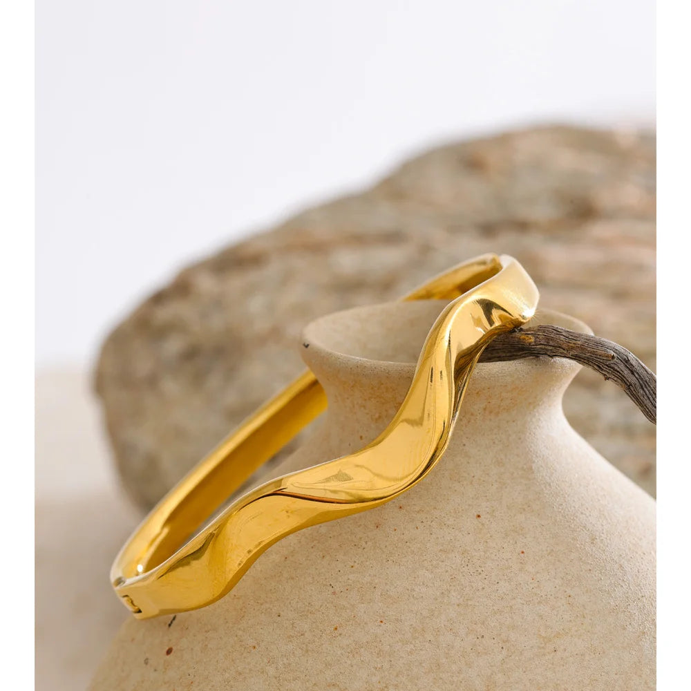Stylish gold cuff with sleek minimalist silhouette