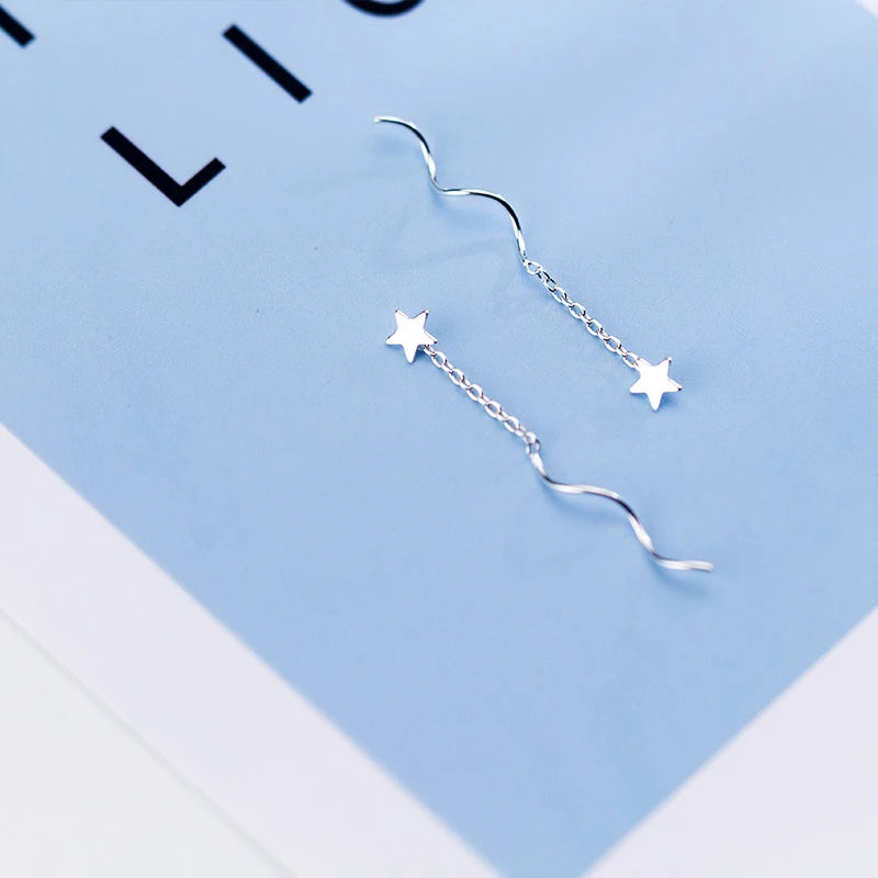 Delicate star charm earrings flowing chain sterling silver