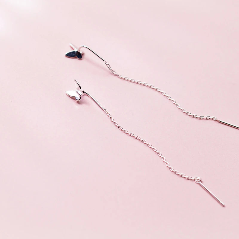 Sterling silver butterfly earrings shown as elegant drop earrings