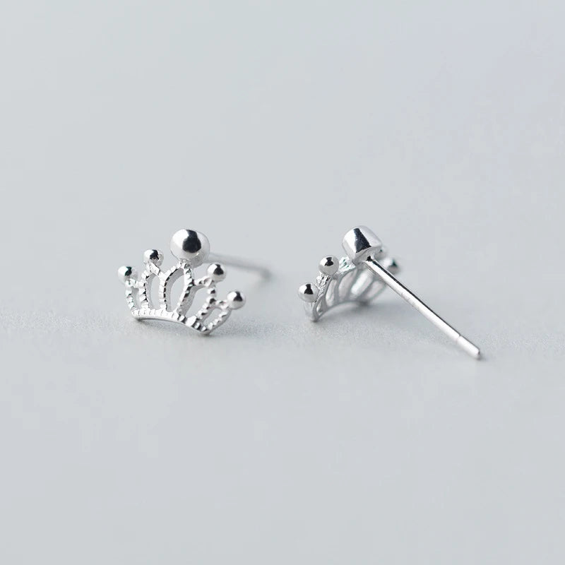 Stud earrings in silver sized as kids earrings with gentle shine
