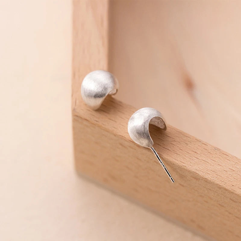 Sterling silver earrings as classic stud earrings for women