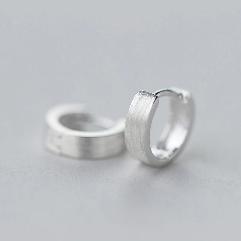 Sterling silver hoop earrings with polished silver hoop shine