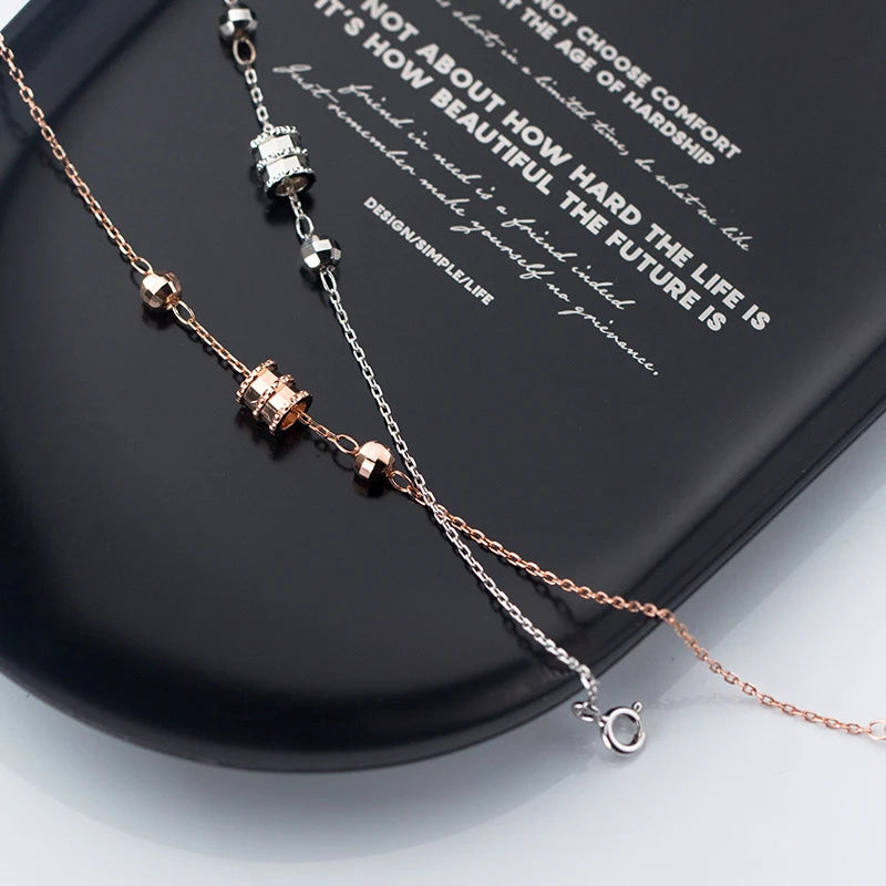 Sterling Silver and Rose Gold Bead Bracelet