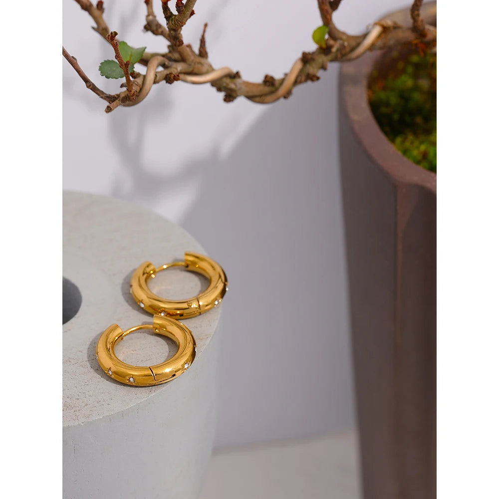 Huggie earrings gold with bright cubic zirconia sparkle for jewelry stores