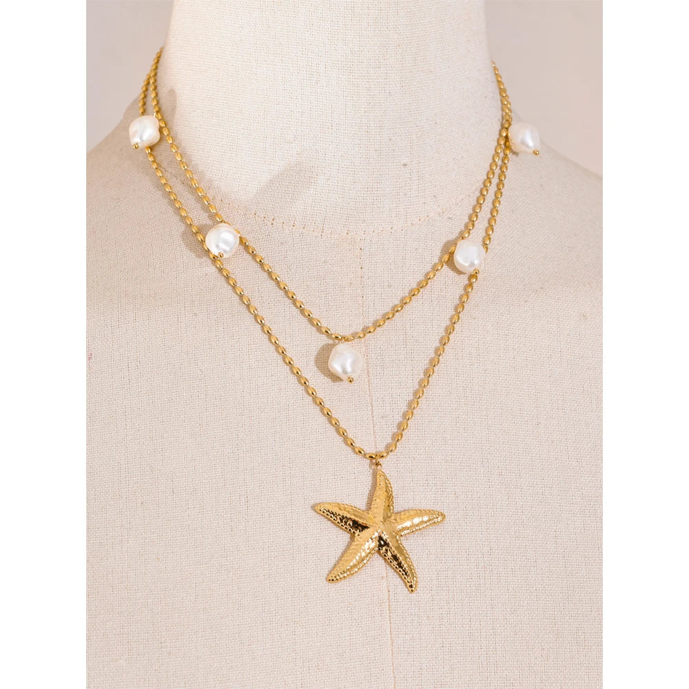 Close view of layered chains showing gold in necklace shimmer