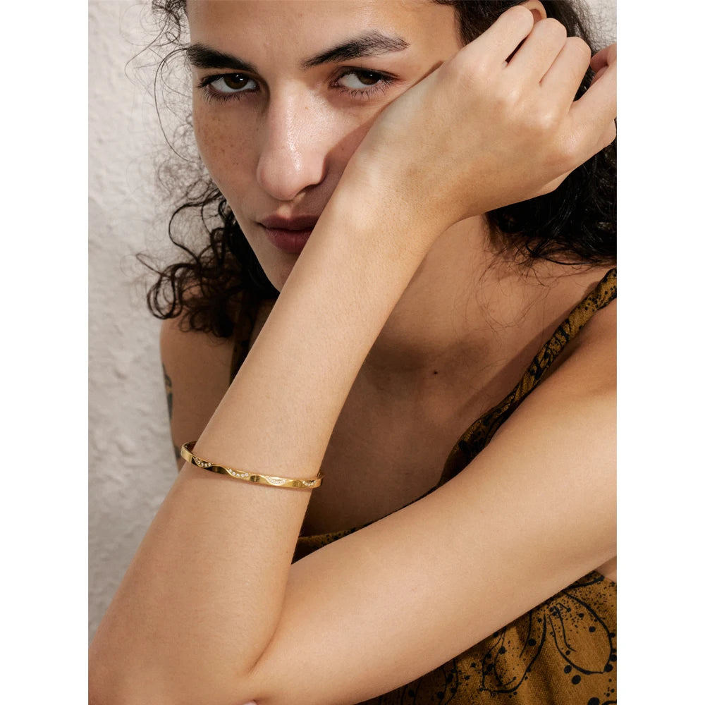 Bracelet with gold plated stainless steel polished finish