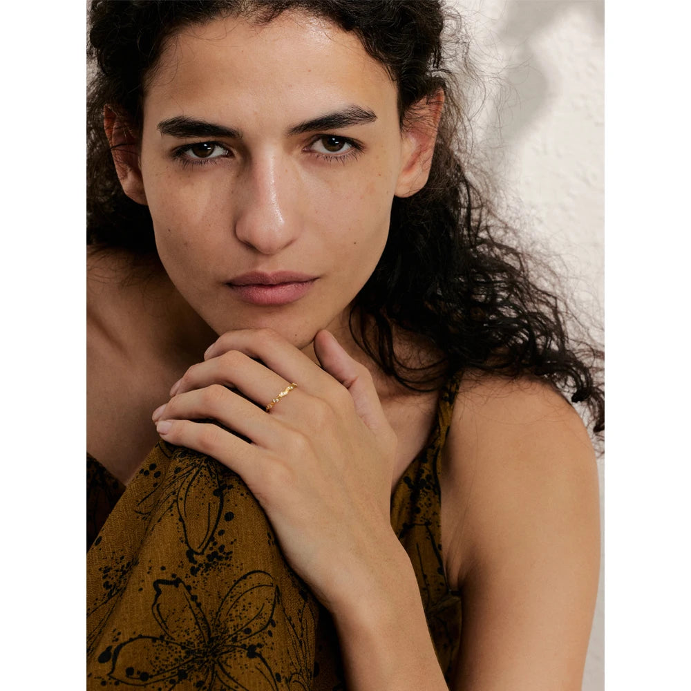 Close view showing ring size clarity and ring size from ring on a slim wave band