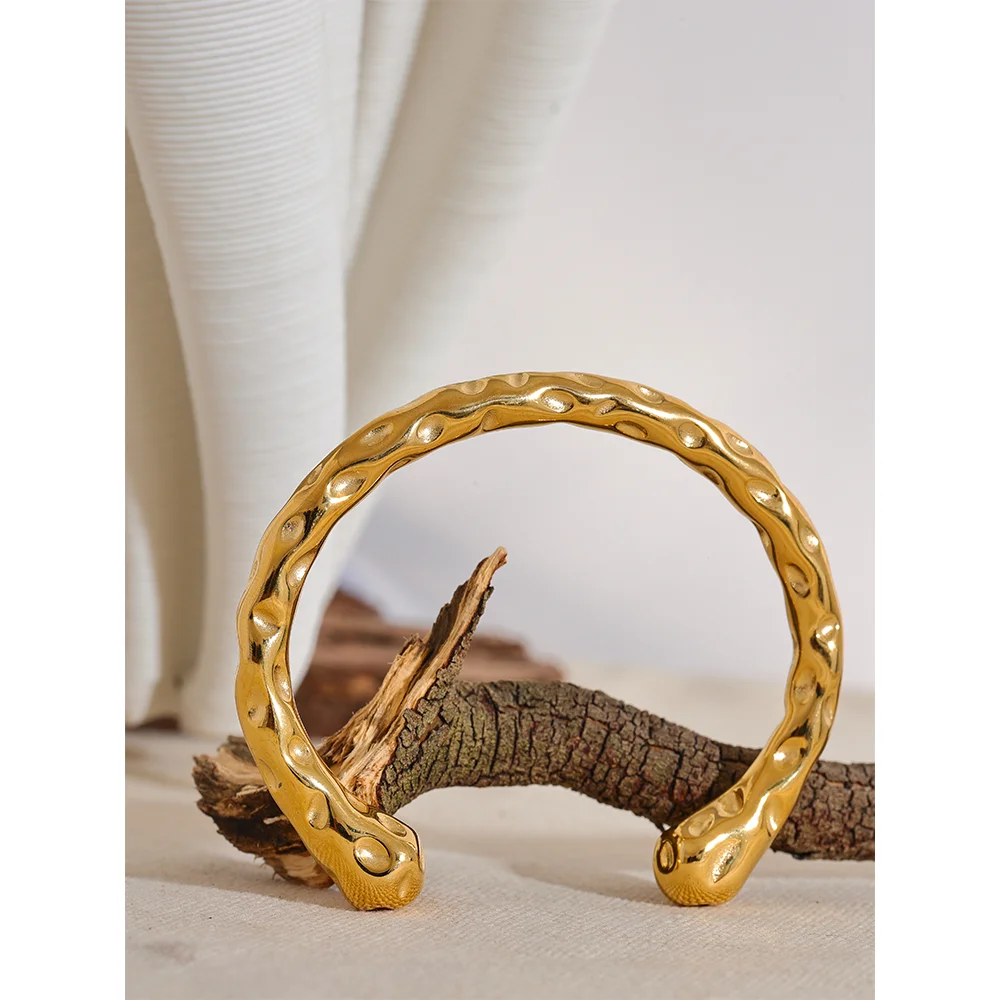 Gold plated finish highlighting bracelet gold on a clean curve