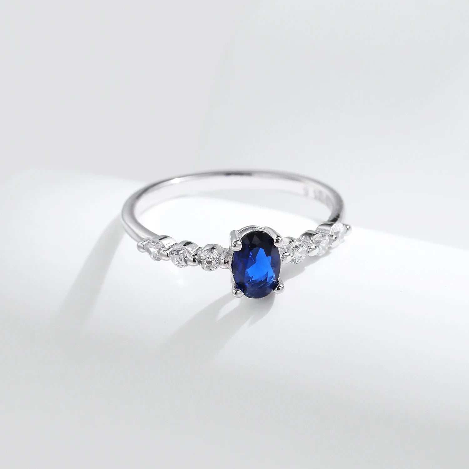 Blue ring oval style presented as a cocktail ring statement