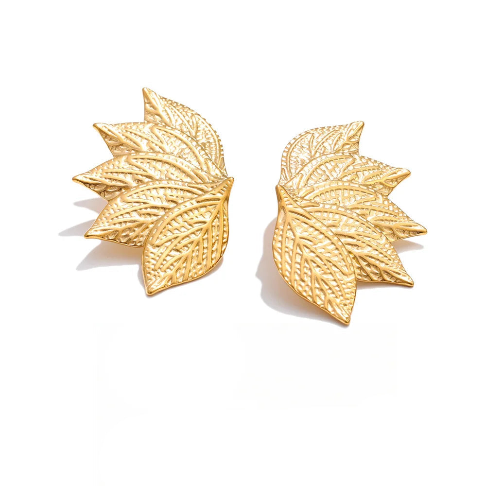 Gold plated metal leaf stud earrings in stainless steel design