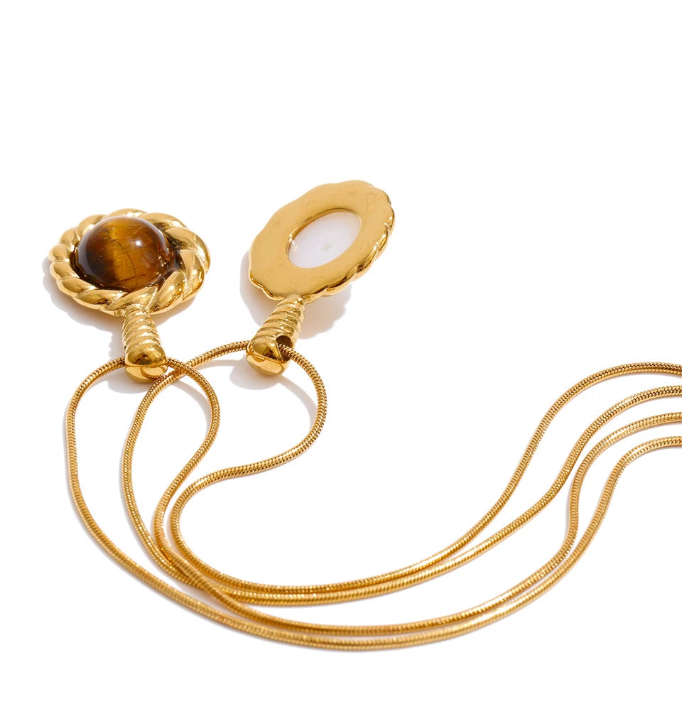 Necklace pearl style featuring round tiger eye stone