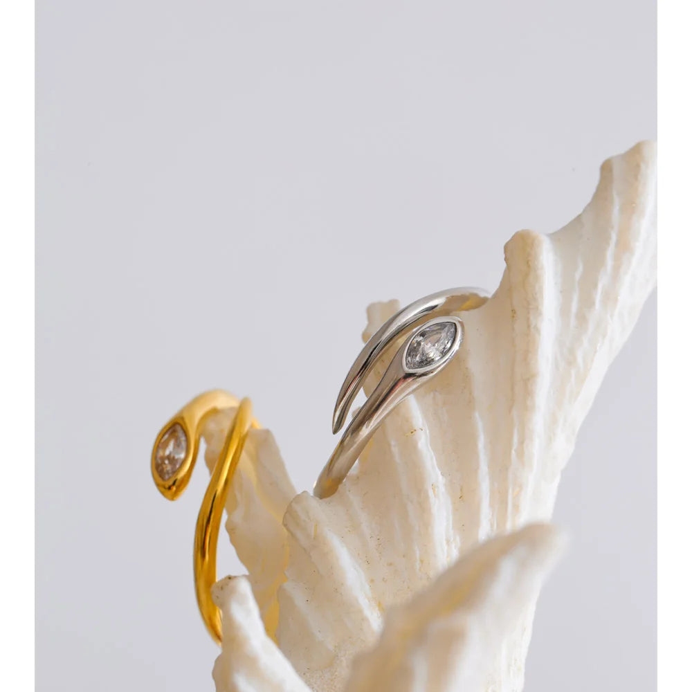 Stainless steel jewelry ring with snake design and gold shine