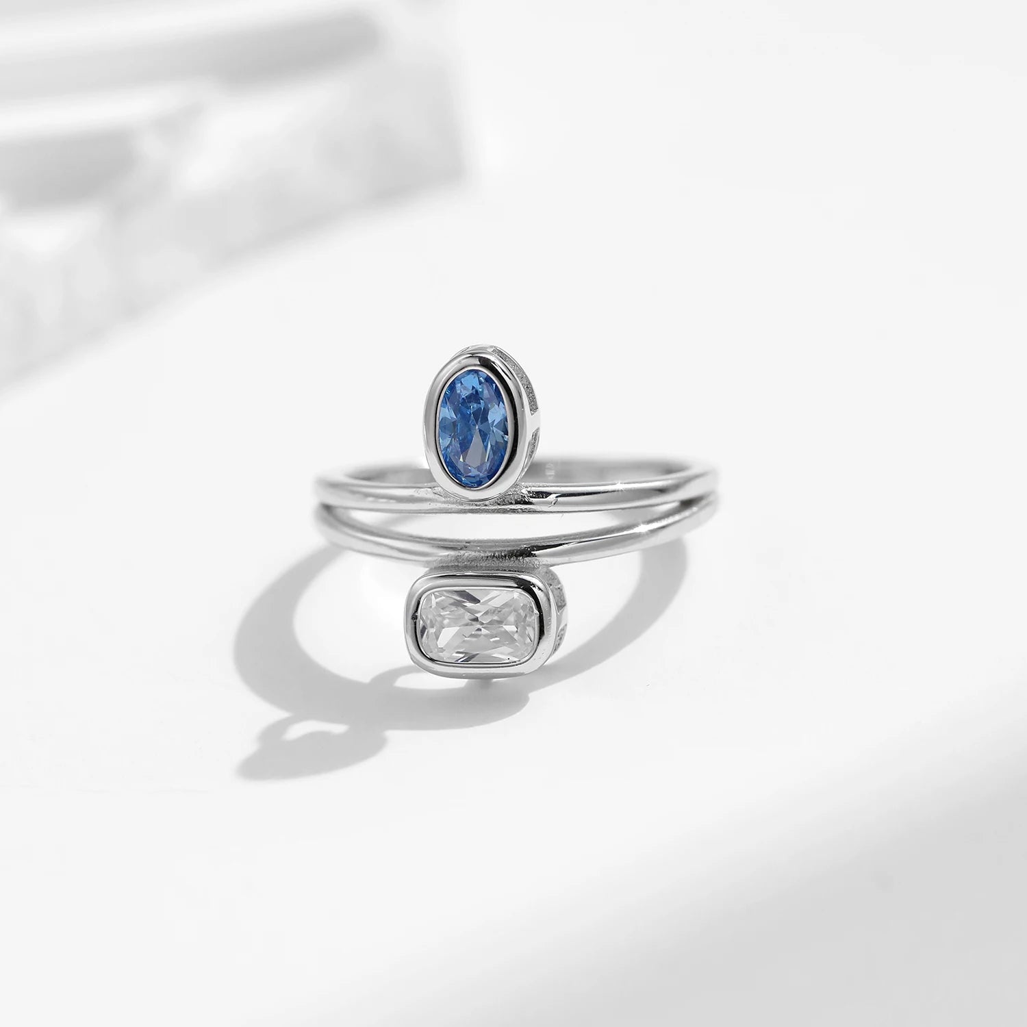 Sterling silver ring stacked as a stackable ring with emerald cut rings