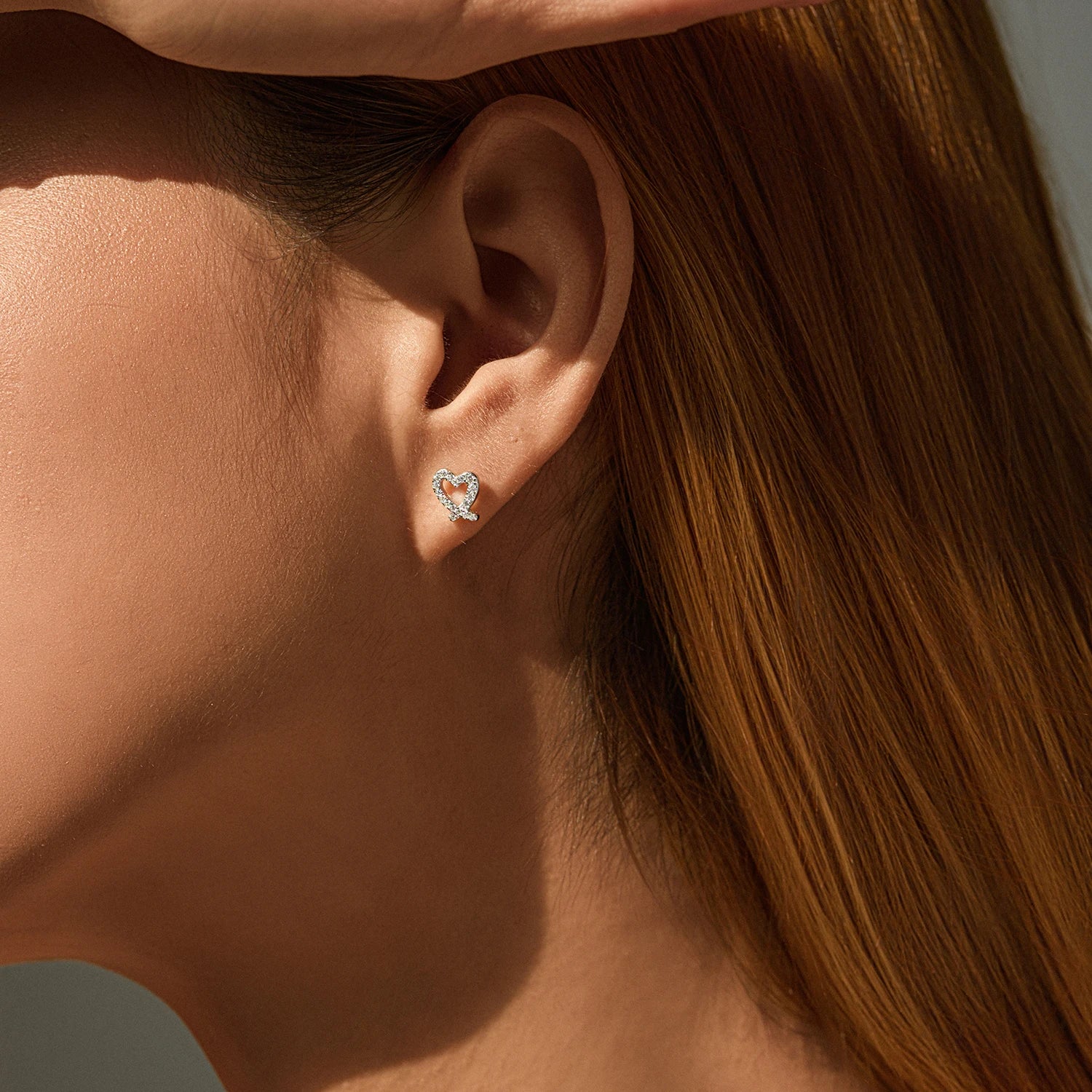 Sparkling moissanite diamond earrings with modern heart design