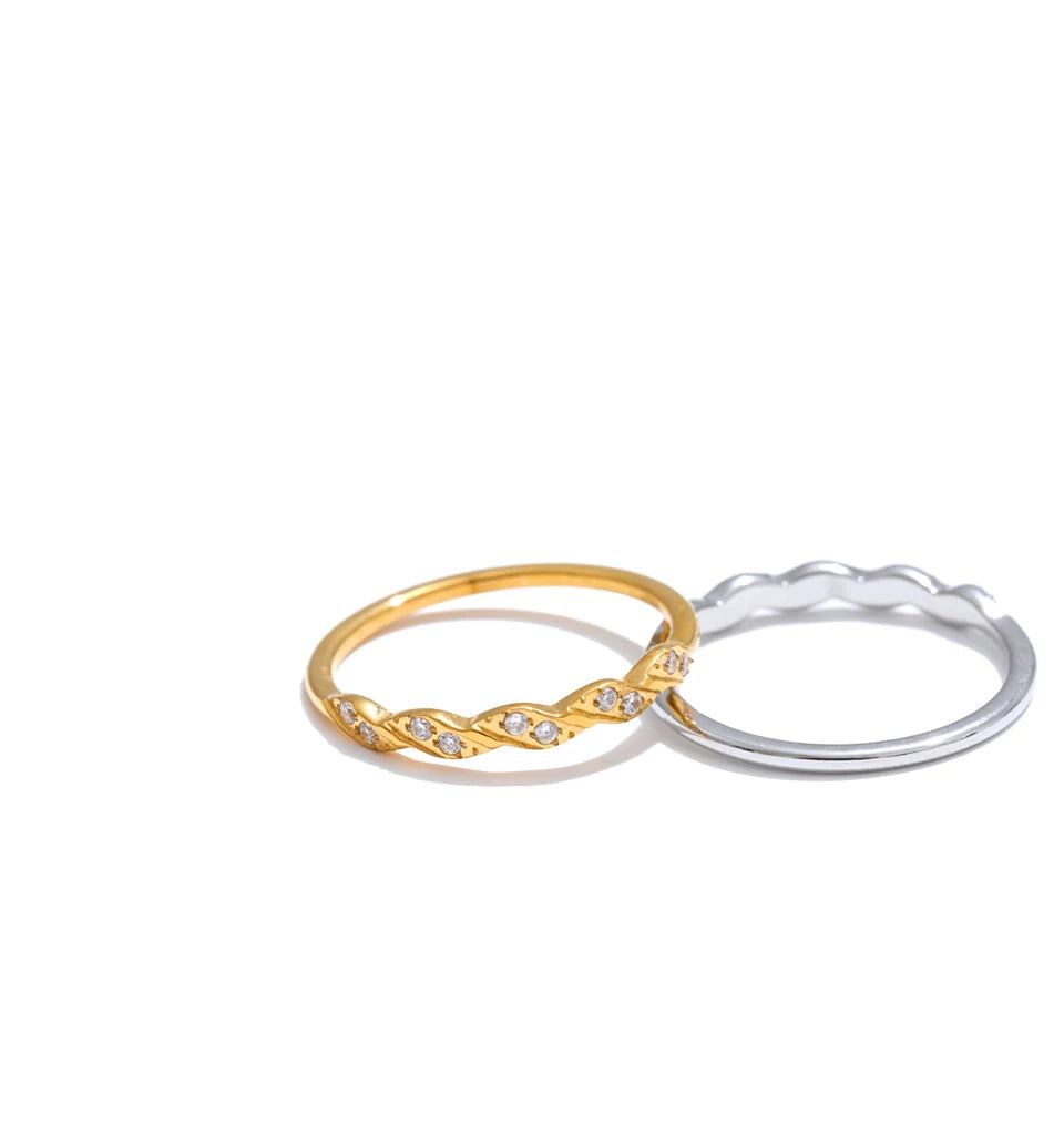 Macro shot of cubic zirconia detail on gold plated stainless steel for jewelry