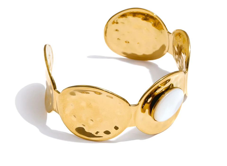 Wide wrist-piece gold fashion accessory ideal for layering with bracelet bracelets