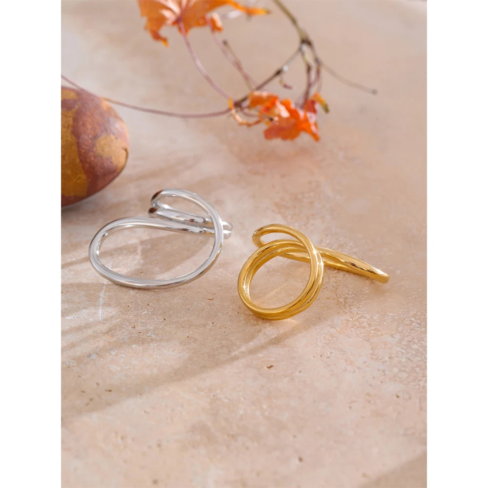 Finger and ring view of geometric size ring in stainless steel