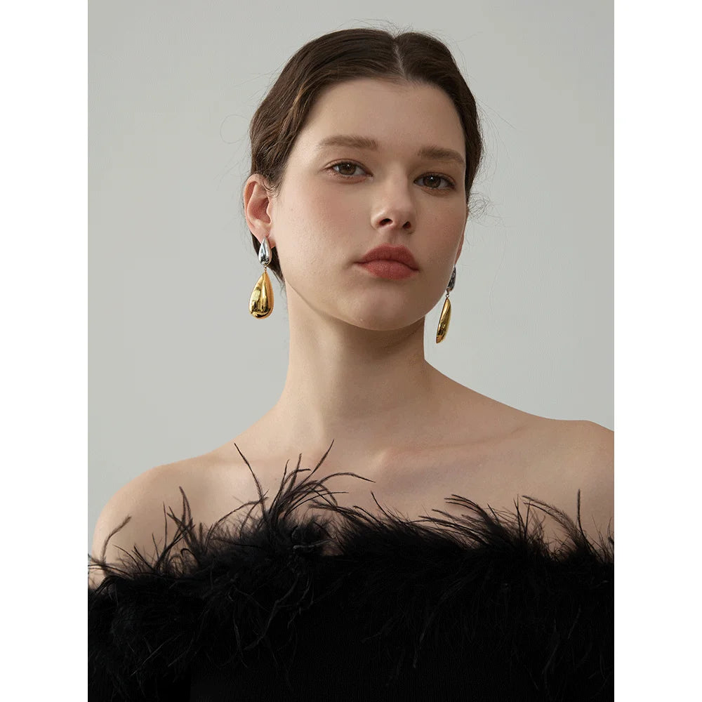 Drop earrings gold finish pairing with earrings and gold looks