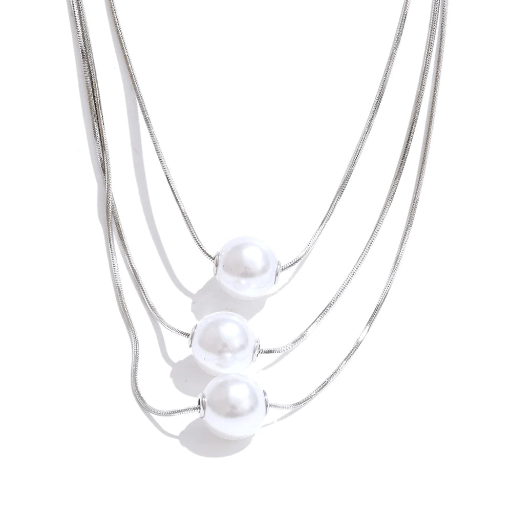 Pearl with necklace arrangement in modern gold plated tone