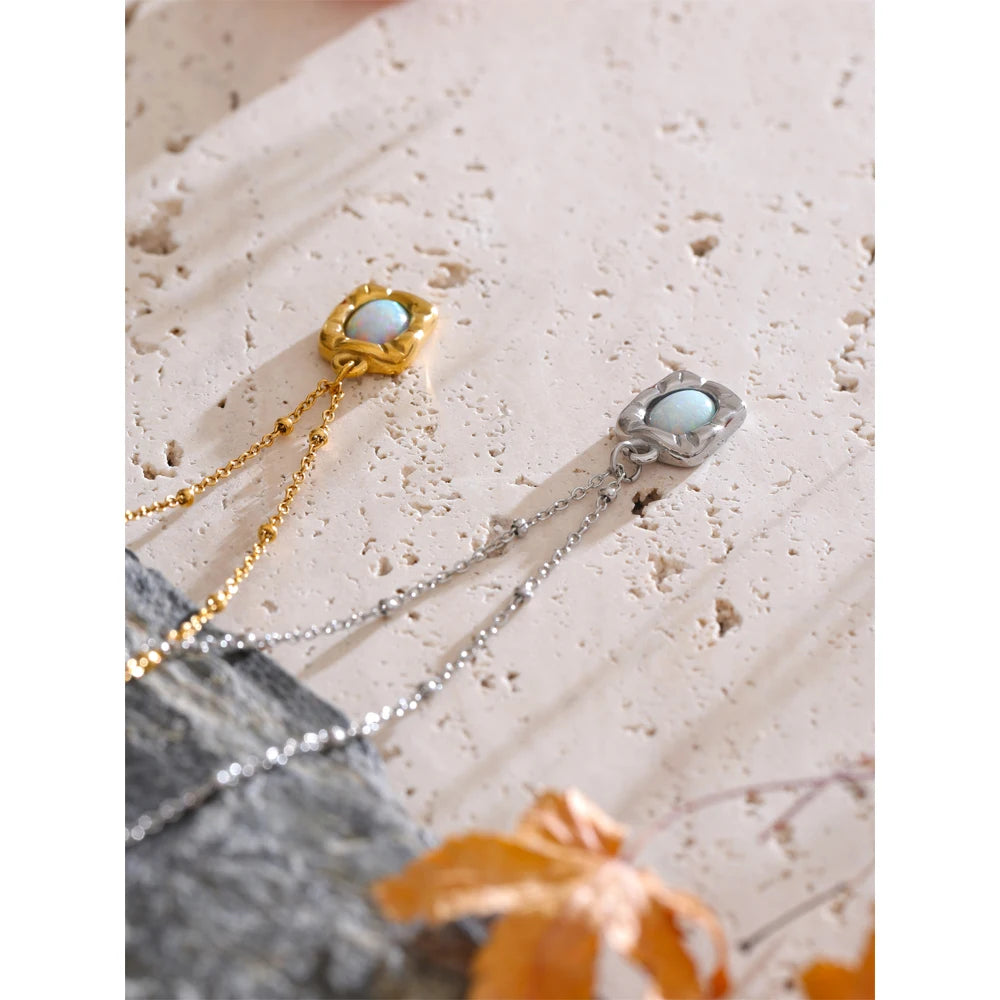 Close up of opal stone sparkle on a pendant necklace with polished edges