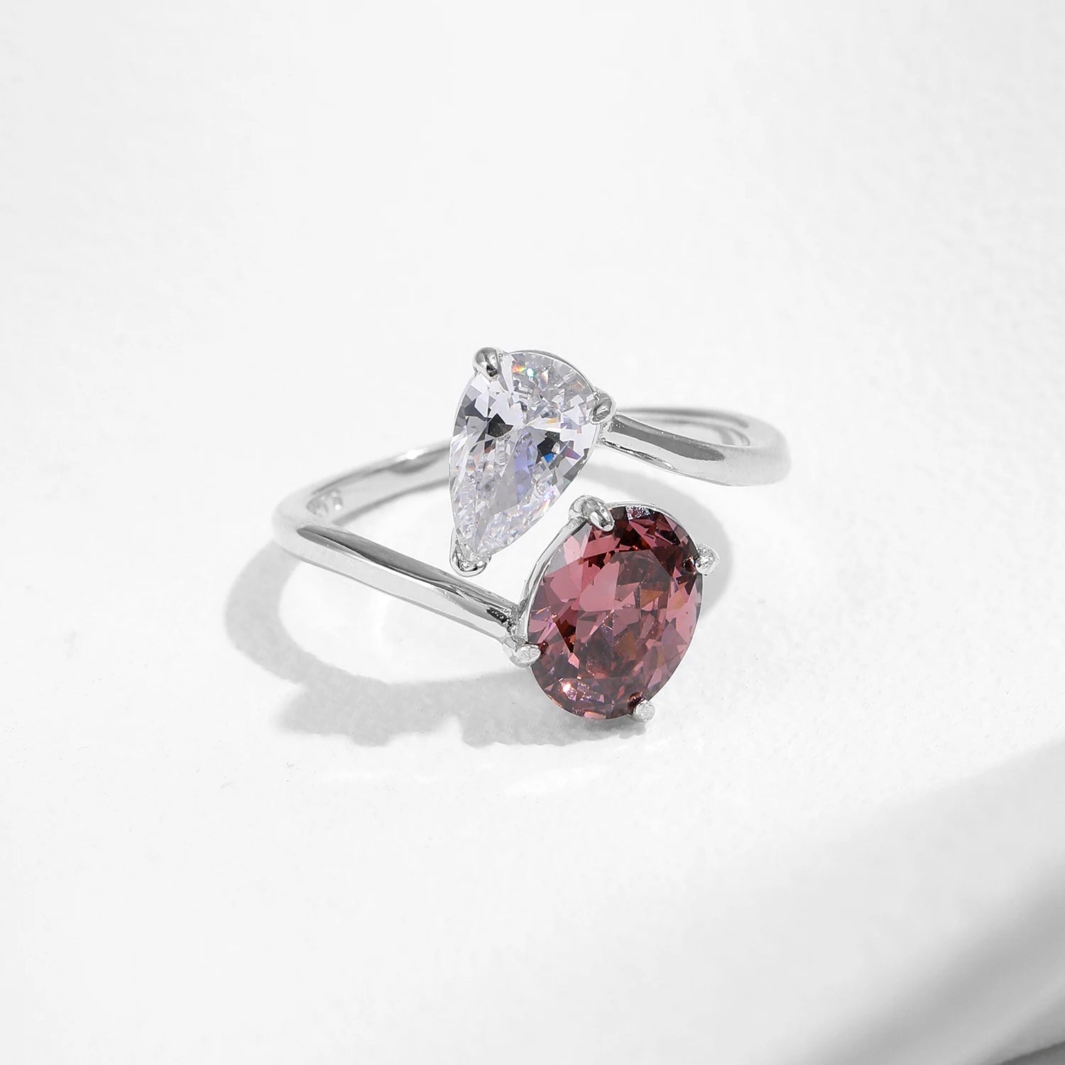 Adjustable ring displayed with tag showing ring size and ring with size options