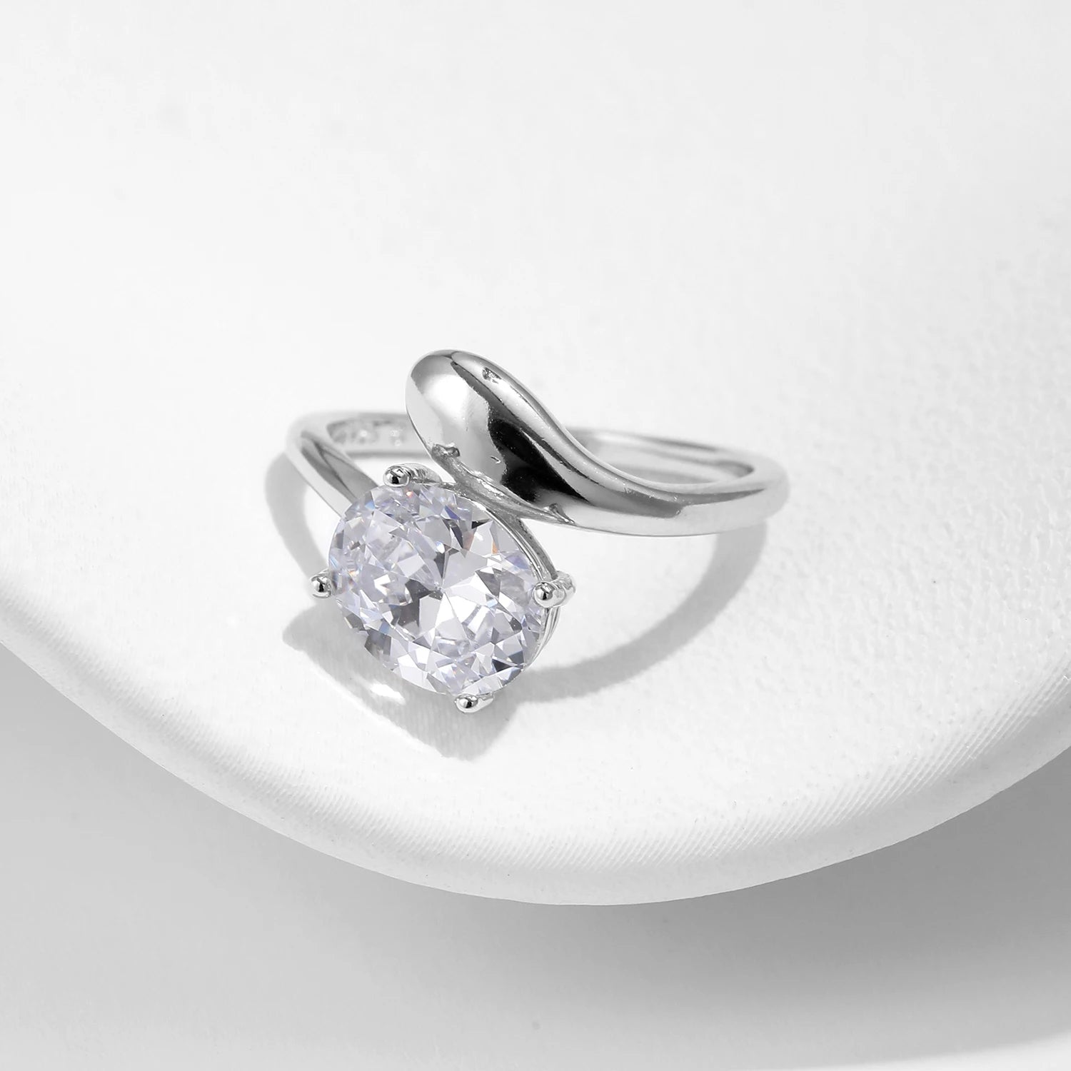 Sterling silver ring styled as a cocktail ring with graceful ring oval lines