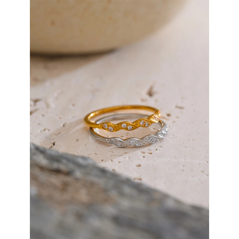 Cubic zirconia line sparkling on a ring with size slim gold plated band