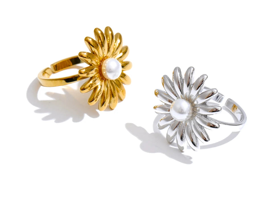 Gold ring paired with matching sunflower earrings