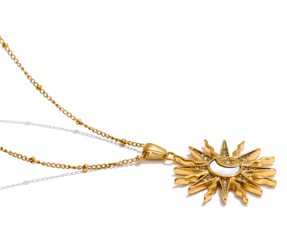Day to night styling of a charm necklace as a refined pendant gold necklace