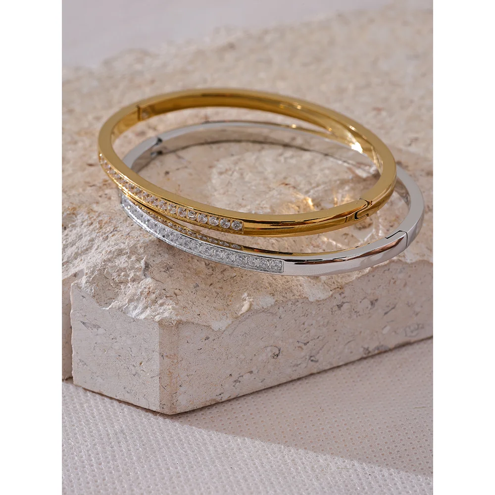 Delicate gold bangle bracelets style with cubic zirconia accent