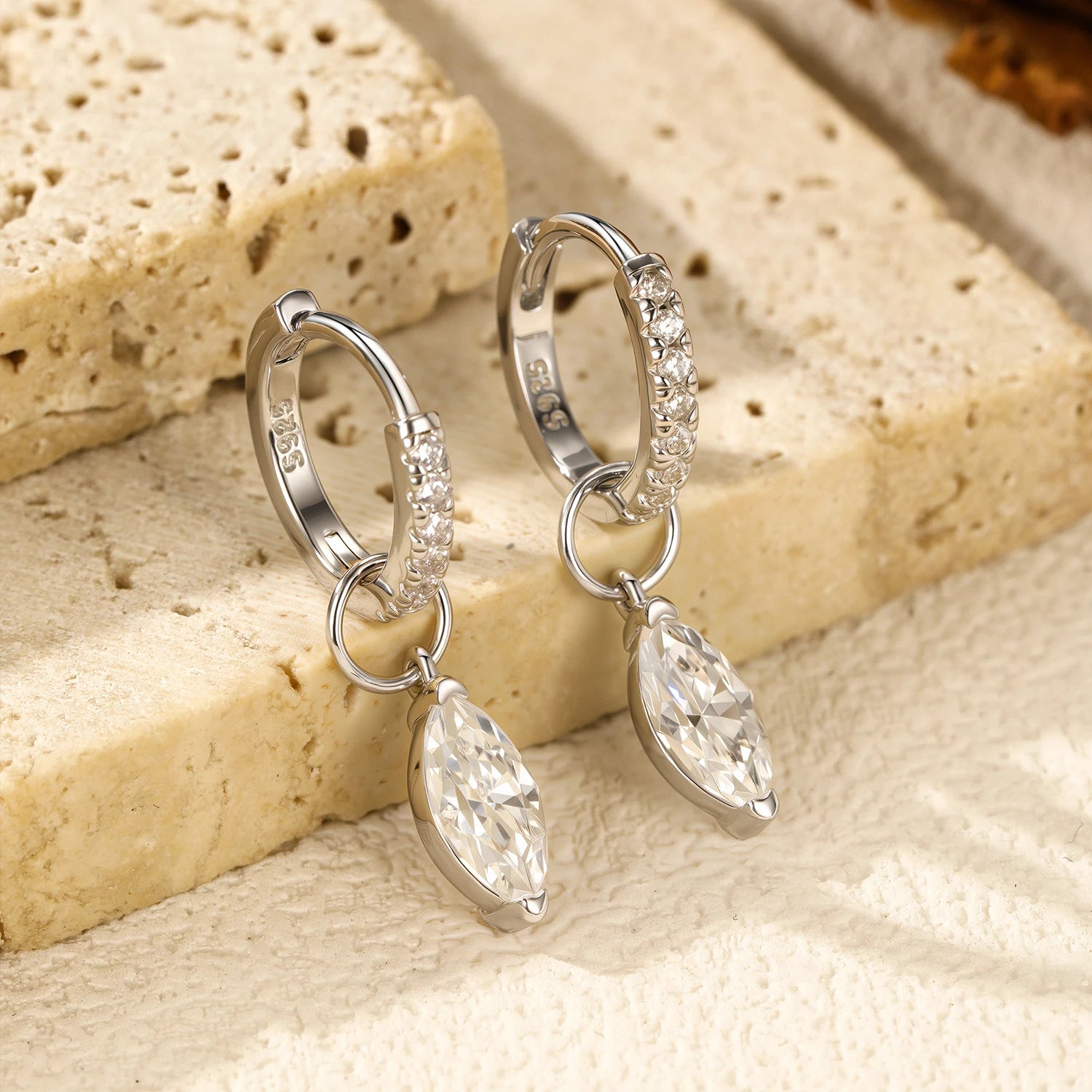 Sparkling moissanite jewelry earrings with halo inspired finish