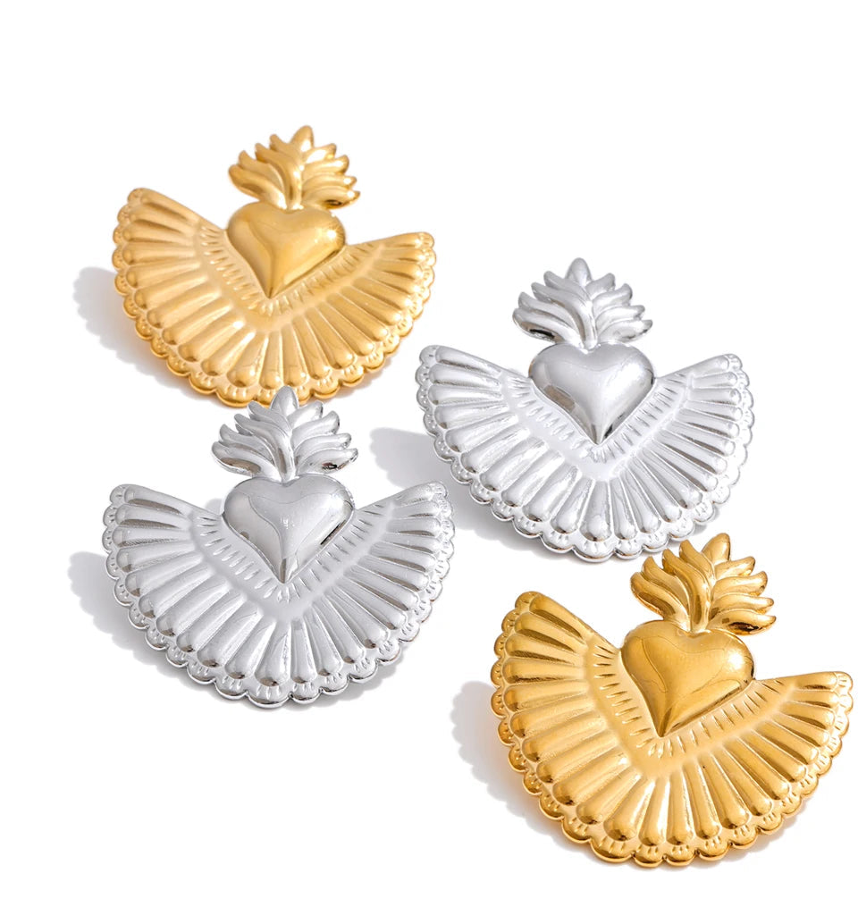 Trendy gold gold earrings with charming heart silhouette