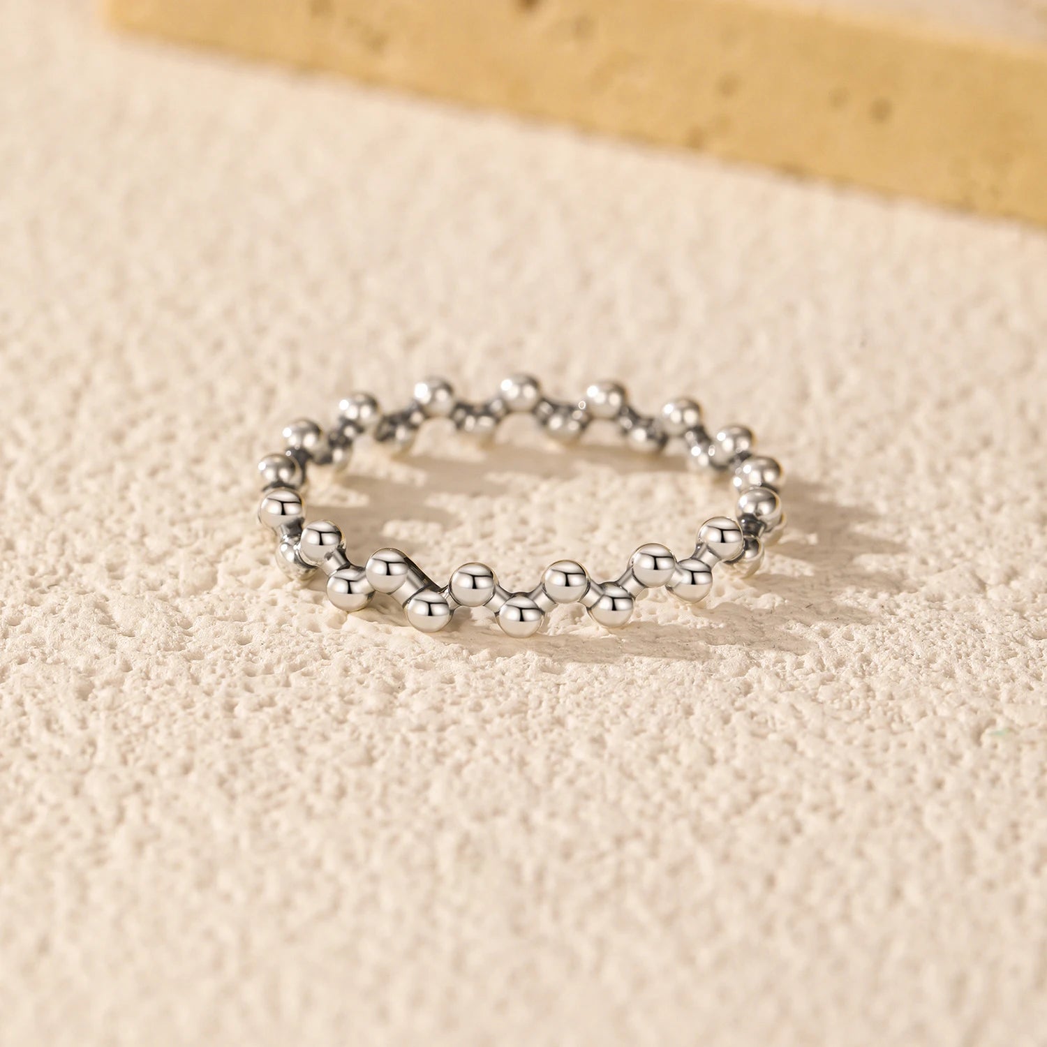 Ring size fixed sterling silver with bead detail